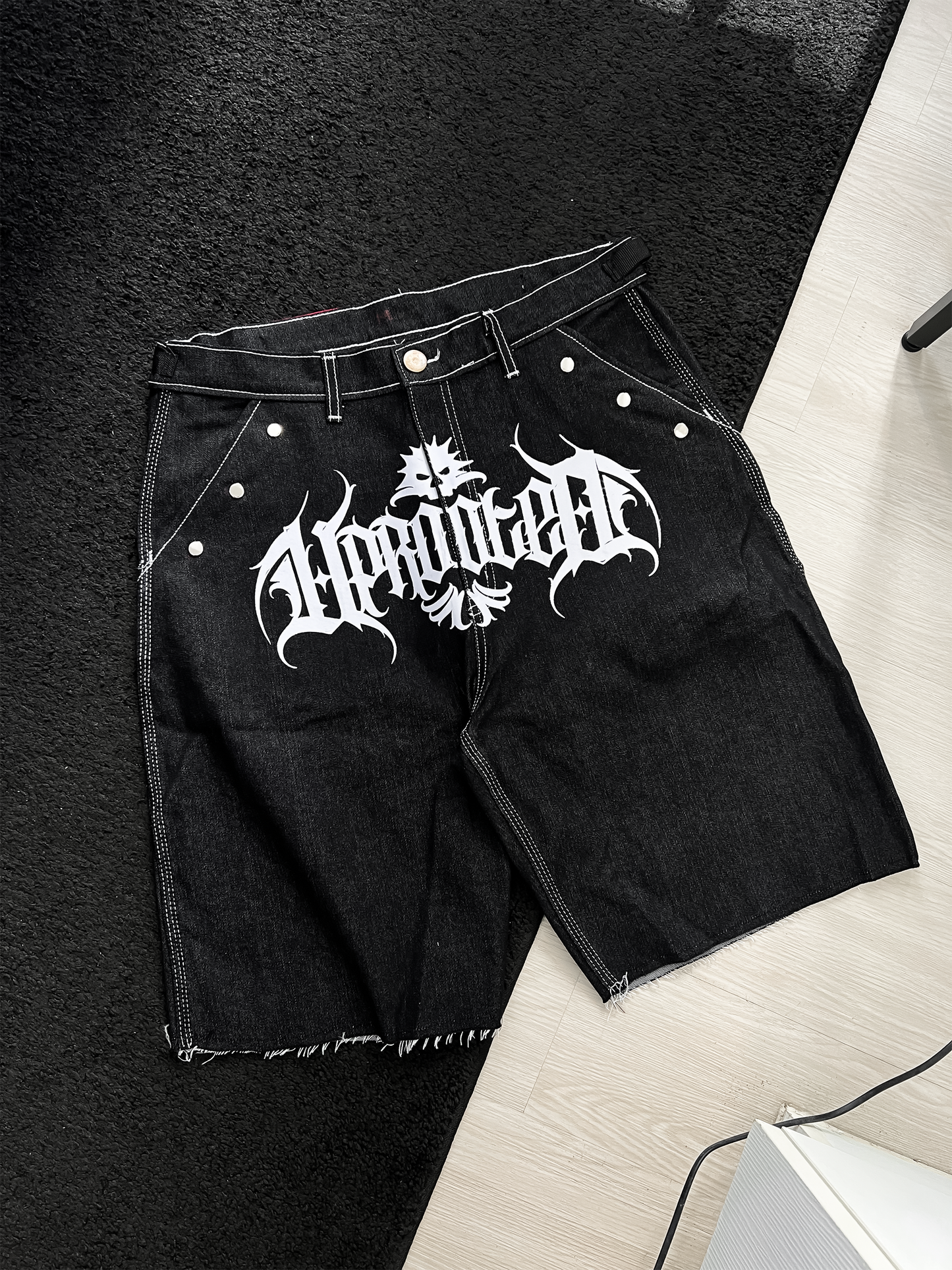 "HARD CUT DENIM JORTS" IN DENIM BLACK